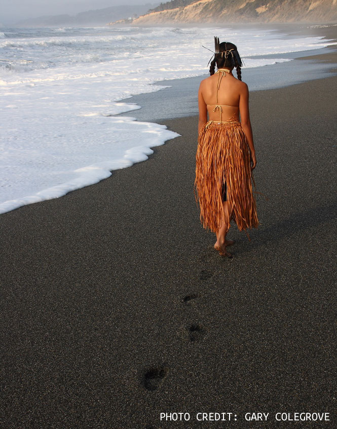 Woman walking beach